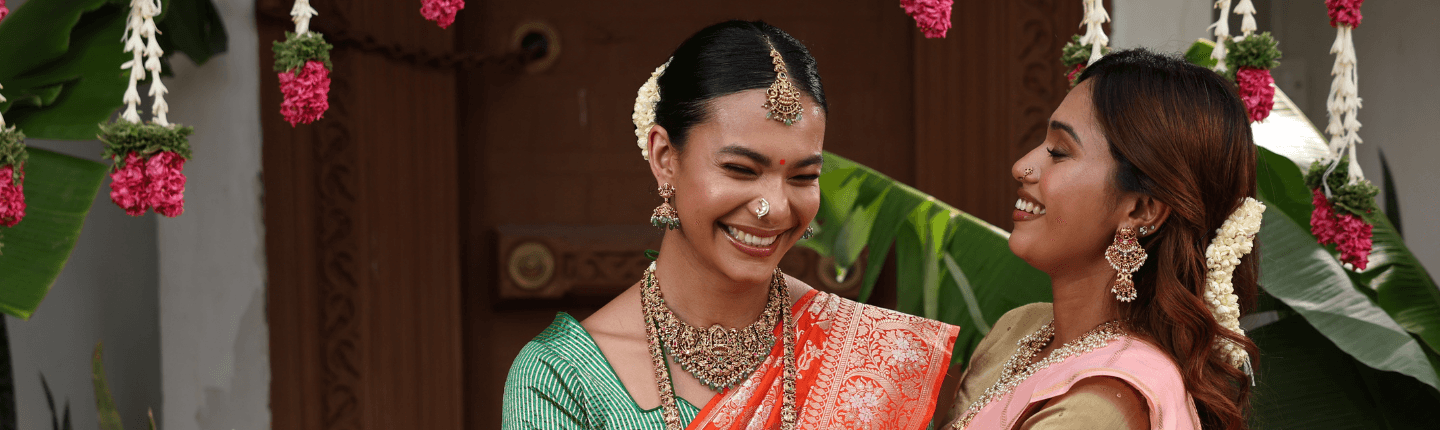 Brides and bridesmaids in ceremonial silk sarees